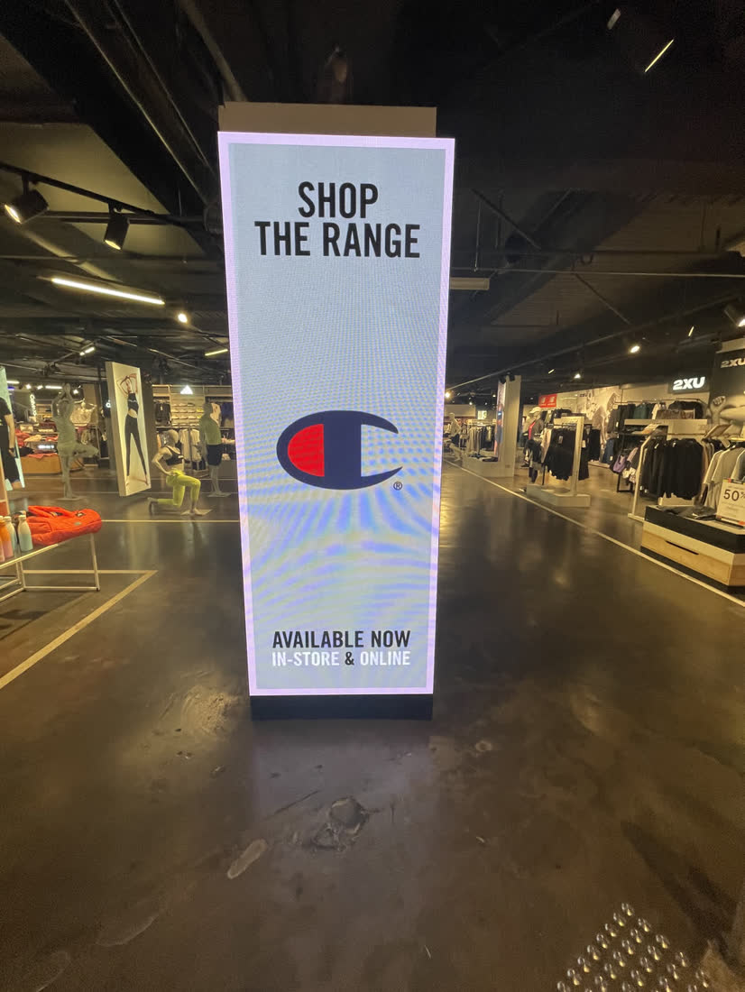Champion — Freestanding LED totem, in-store